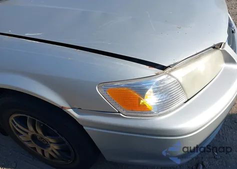 2000 Toyota Camry Le from USA, damaged, VIN 4T1BG22K0YU628123